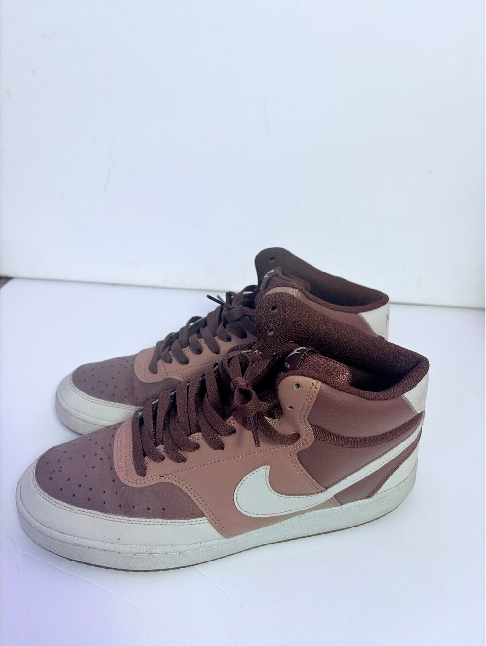 Nike brown and cream high top sneakers